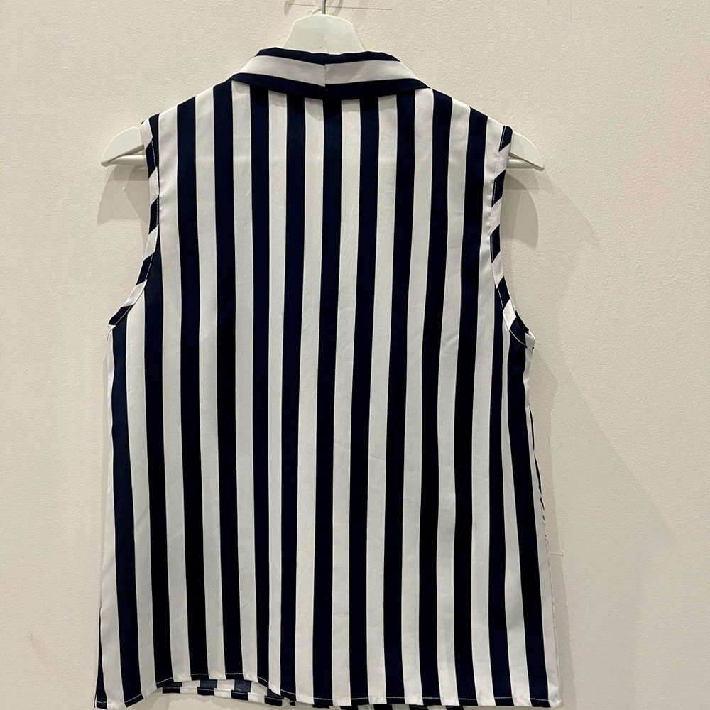 Small white and blue striped blouse.